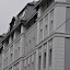 Robert-Blum-Gasse in Wien – Sanierung, Tragwerk in Holz-Stahl-Konstruktion, zusätzliche Dachgeschoßwohnungen mit hellen Räumen dank Dachflächenfenster und Tonnengauben