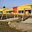 Kindergarten Böheimkirchen – Passivhaus-Kindergarten mit Zellulosedämmung bis 48 cm, Putzfassade, teilweise färbige Eternit-Fassade, kurze Bauzeit durchhohen Vorfertigungsgrad
